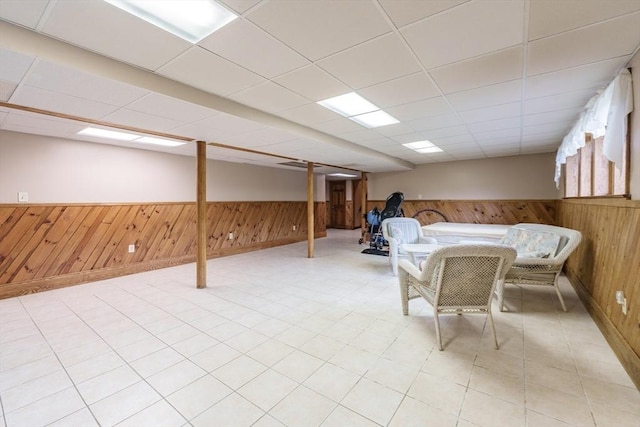 1170 E St, Ludlow, MA 01056 - finished basement featuring wood walls, a wainscoted wall, and a drop ceiling