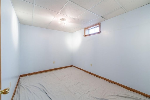 1170 E St, Ludlow, MA 01056 - basement featuring a paneled ceiling and light colored carpet