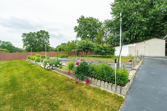 1170 E St, Ludlow, MA 01056 - view of yard with a garden and an outbuilding