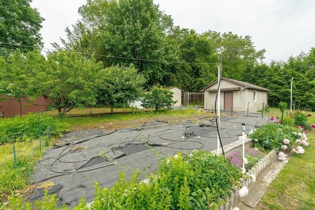 1170 E St, Ludlow, MA 01056 - view of yard featuring an outbuilding