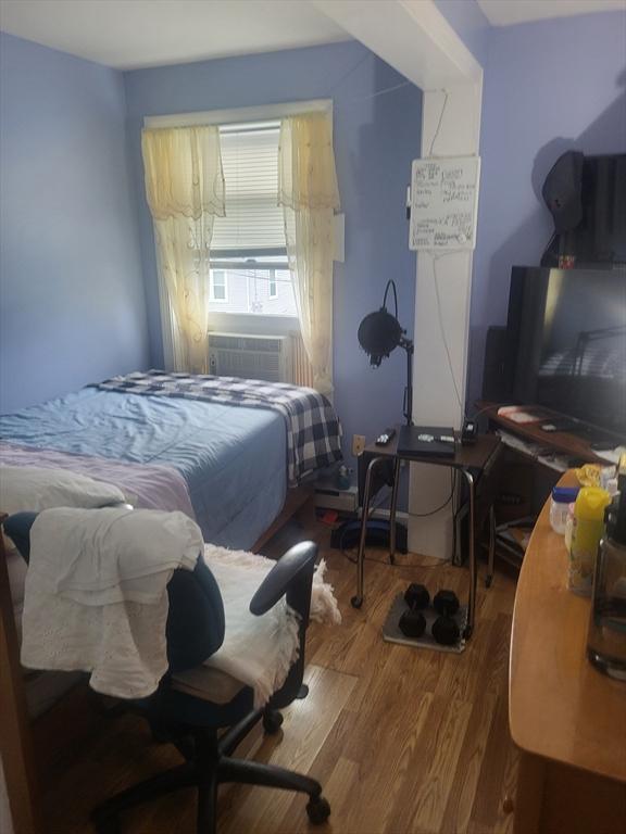 21 Delford Unit 2, Boston, MA 02131 - bedroom with wood finished floors