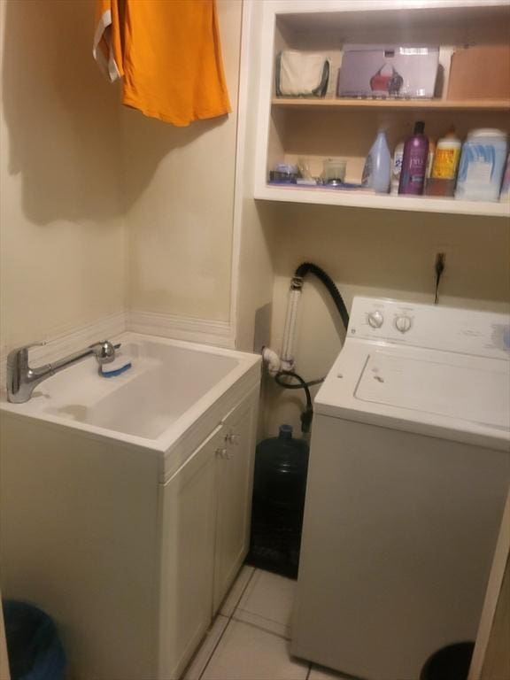 21 Delford Unit 2, Boston, MA 02131 - laundry room featuring washer / clothes dryer and light tile patterned floors