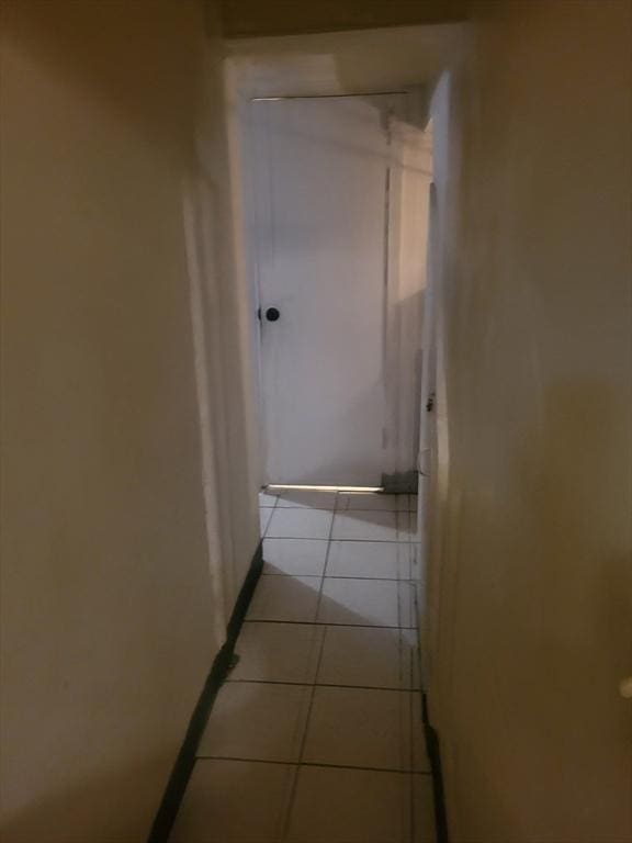 21 Delford Unit 2, Boston, MA 02131 - corridor featuring light tile patterned flooring