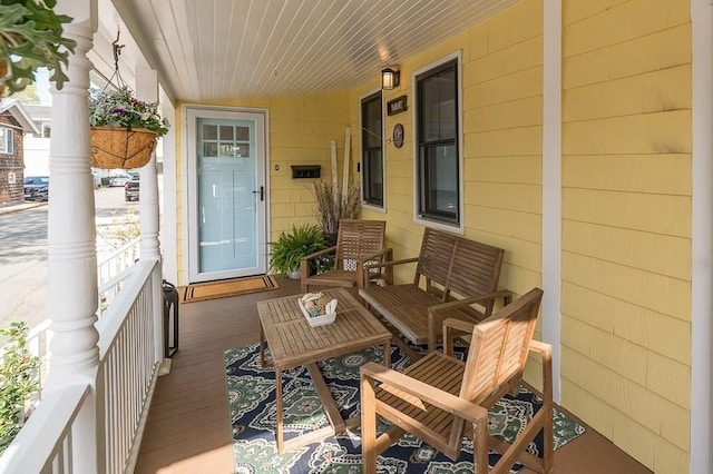 balcony featuring a porch
