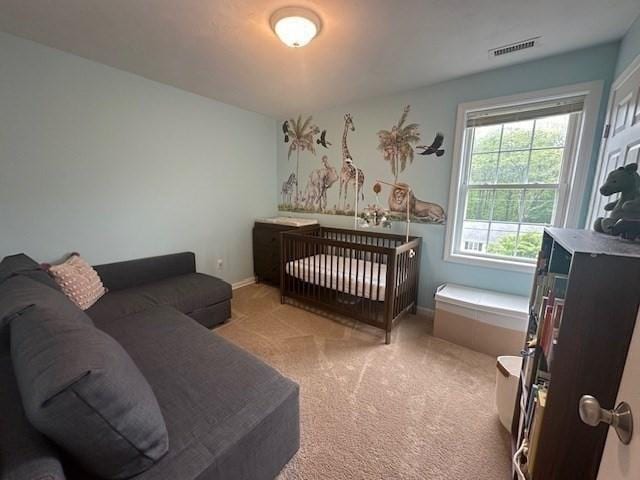 bedroom featuring carpet and baseboards