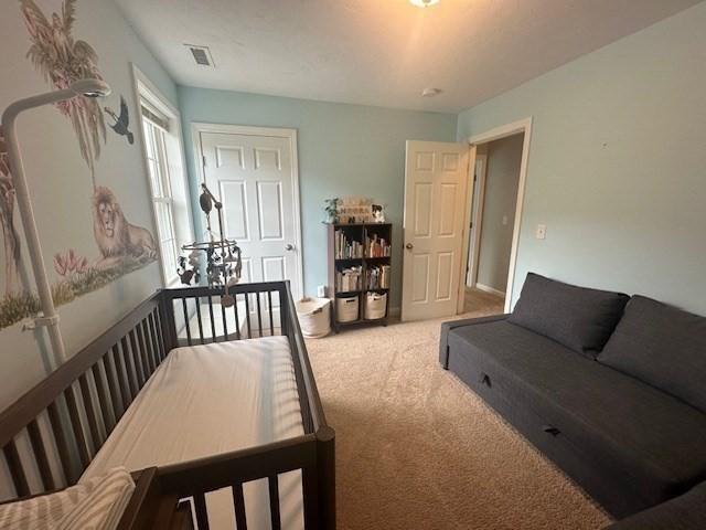 bedroom featuring carpet flooring