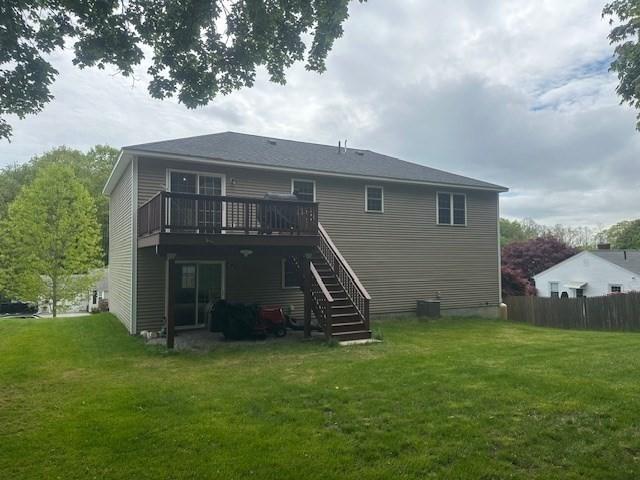 back of house with a deck, stairs, and central air condition unit