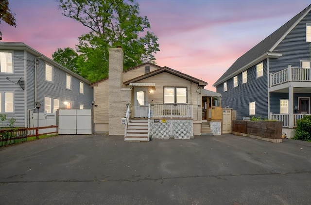 26 Hanna St, Quincy, MA 02169 - view of front of property featuring a chimney