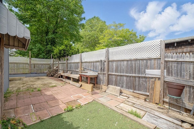 26 Hanna St, Quincy, MA 02169 - fenced backyard featuring a patio