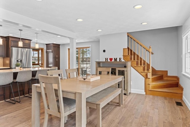 dining room featuring light hardwood / wood-style floors