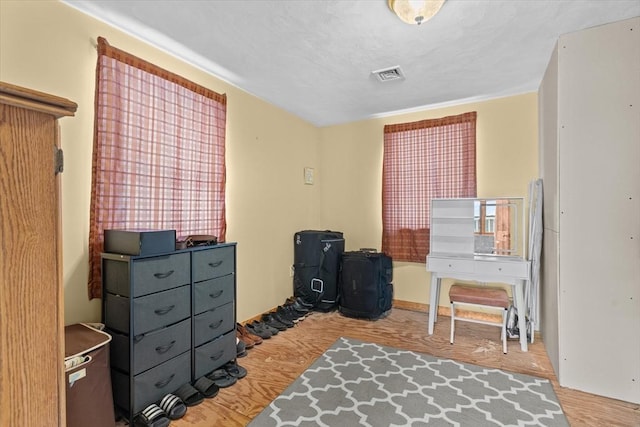 bedroom with light hardwood / wood-style floors