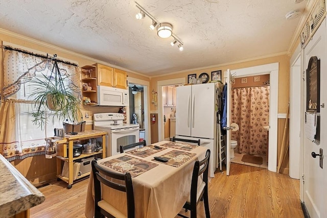 kitchen featuring white appliances, open shelves, light wood-style flooring, light countertops, and crown molding
