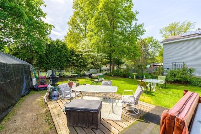 deck with outdoor dining space