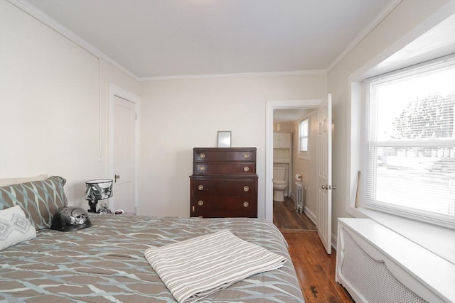 bedroom with crown molding, radiator, dark wood-type flooring, and multiple windows