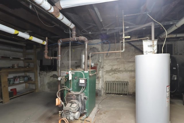 utility room featuring radiator and water heater