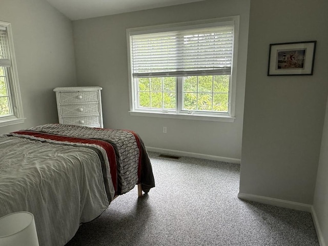 183 Monomoscoy Rd, Mashpee, MA 02649 - bedroom with multiple windows and carpet flooring