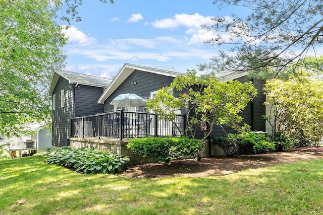 5 Summit View Dr, Swampscott, MA 01907 - rear view of property featuring a lawn and a wooden deck