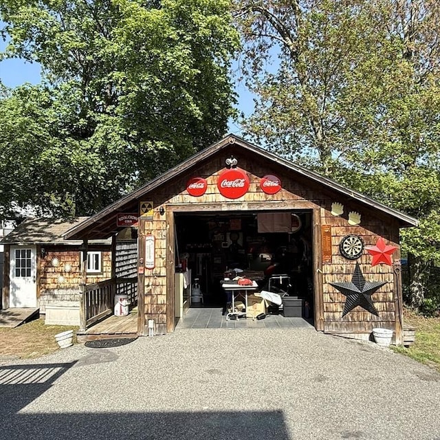 garage featuring driveway