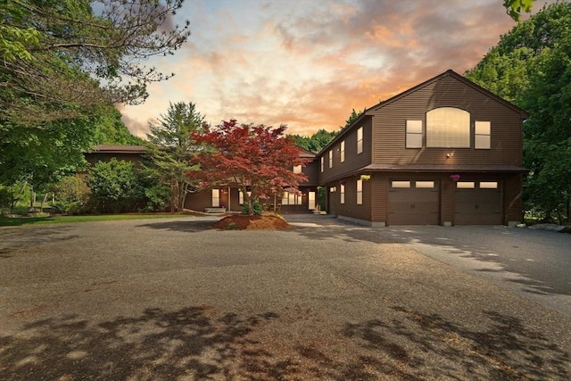 364 Chestnut St, Wilmington, MA 01887 - view of front of property with an attached garage and driveway