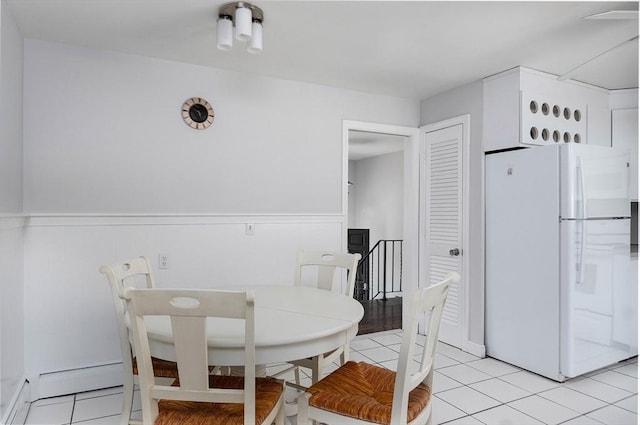 38 Juniper Ln, Holden, MA 01520 - dining room featuring light tile patterned flooring and wainscoting