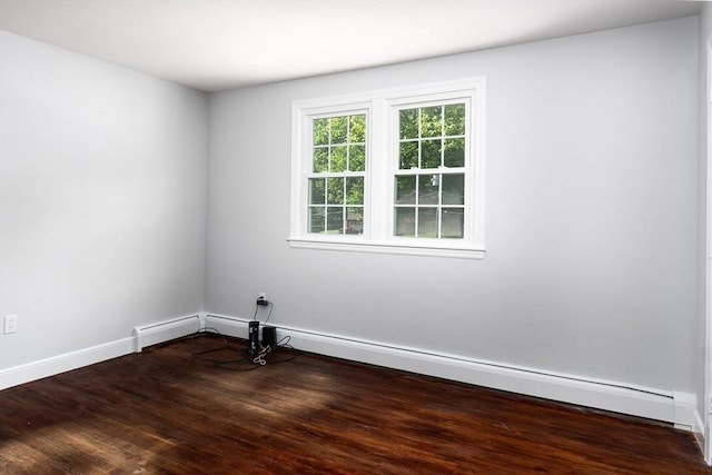 38 Juniper Ln, Holden, MA 01520 - spare room featuring wood finished floors, baseboards, and a baseboard heating unit
