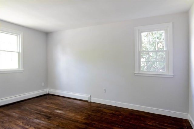 38 Juniper Ln, Holden, MA 01520 - spare room featuring plenty of natural light, baseboards, and dark wood-style flooring