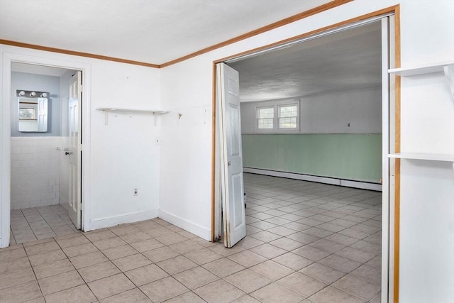 38 Juniper Ln, Holden, MA 01520 - empty room featuring baseboard heating, light tile patterned floors, and crown molding