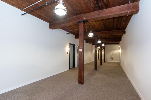 basement featuring light carpet and wood ceiling