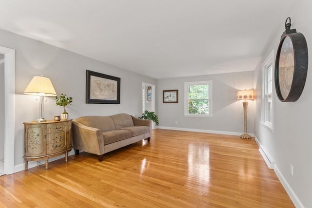 124 Hillside Rd, North Andover, MA 01845 - living area featuring light wood finished floors and baseboards