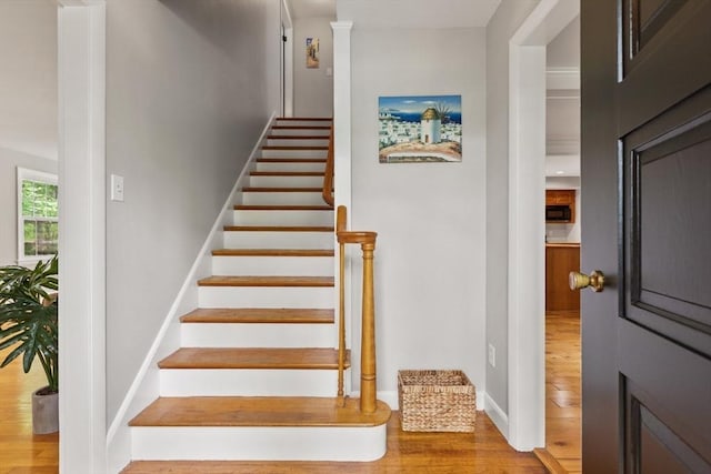 124 Hillside Rd, North Andover, MA 01845 - stairs featuring wood finished floors and baseboards