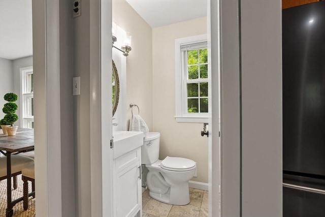 124 Hillside Rd, North Andover, MA 01845 - bathroom with toilet and baseboards