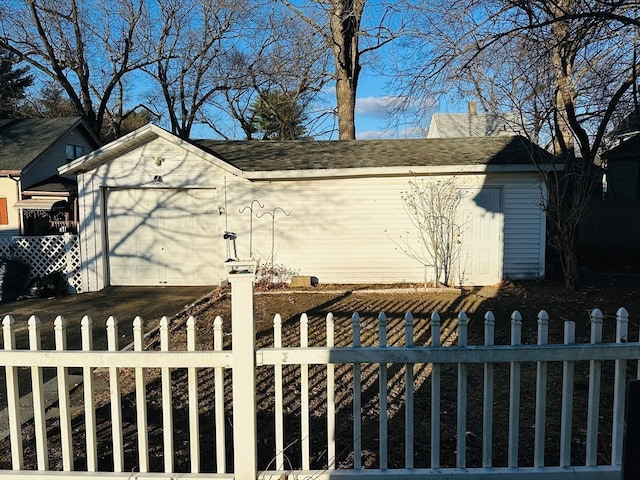 view of side of home with a garage