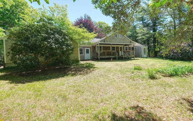 175 Knotty Pine Ln, Barnstable, MA 02632 - view of green lawn with a porch