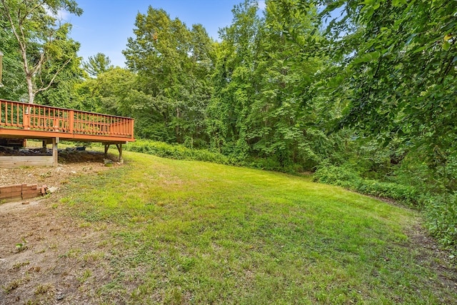 view of yard with a deck