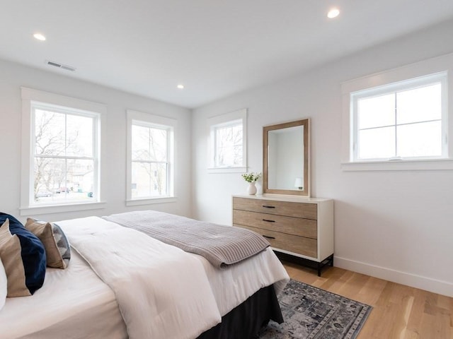 bedroom featuring light wood-type flooring