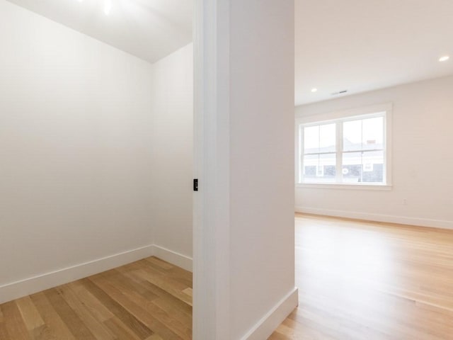 unfurnished room featuring light wood-type flooring