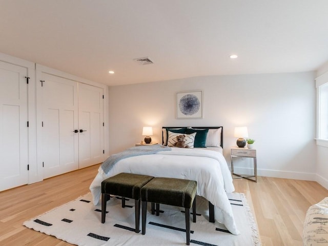 bedroom featuring light hardwood / wood-style flooring