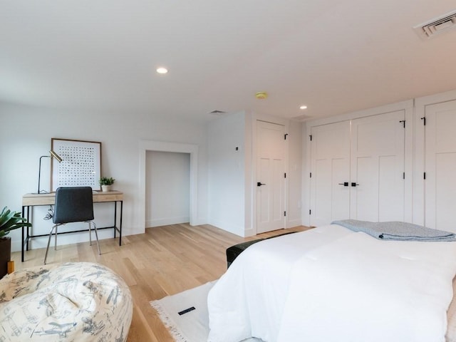 bedroom featuring light wood-type flooring