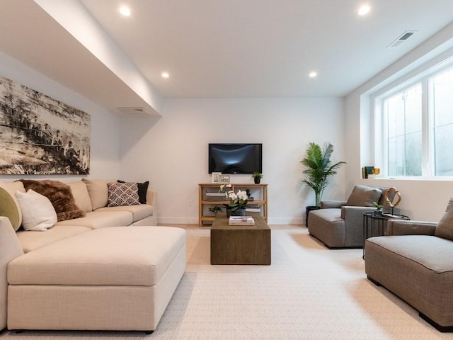 living room featuring light colored carpet