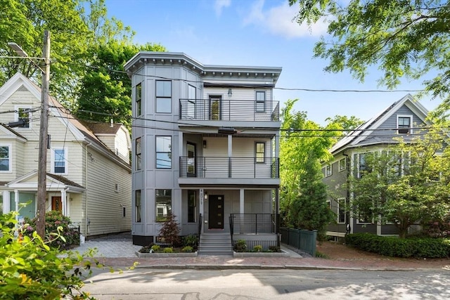 8 Holly Ave Unit 1, Cambridge, MA 02138 - view of front facade with a balcony and covered porch