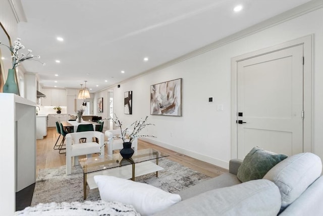 8 Holly Ave Unit 1, Cambridge, MA 02138 - living area featuring light wood-type flooring, ornamental molding, recessed lighting, and baseboards