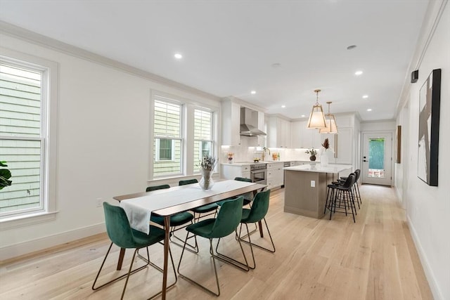8 Holly Ave Unit 1, Cambridge, MA 02138 - dining area featuring ornamental molding, light wood-style flooring, baseboards, and recessed lighting