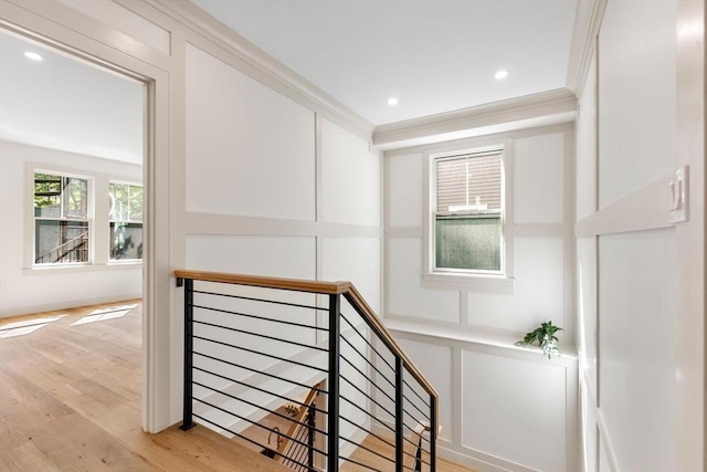 8 Holly Ave Unit 1, Cambridge, MA 02138 - stairs featuring wood finished floors, a decorative wall, crown molding, and recessed lighting