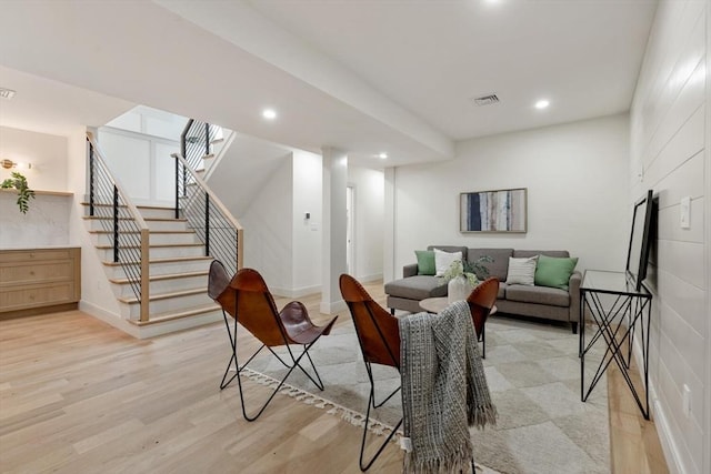 8 Holly Ave Unit 1, Cambridge, MA 02138 - living area with stairway, light wood-style flooring, recessed lighting, and baseboards