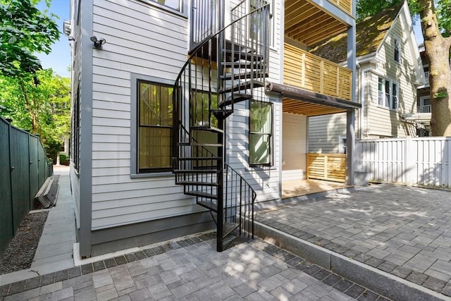 8 Holly Ave Unit 1, Cambridge, MA 02138 - view of side of home featuring stairway and a patio area
