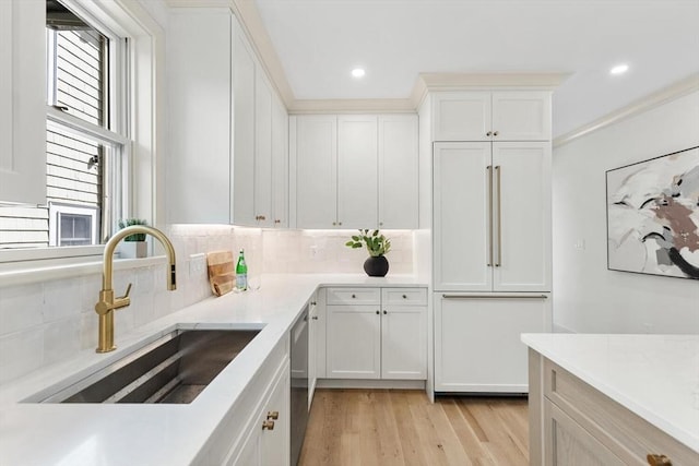 8 Holly Ave Unit 1, Cambridge, MA 02138 - kitchen featuring a sink, backsplash, light wood finished floors, healthy amount of natural light, and recessed lighting