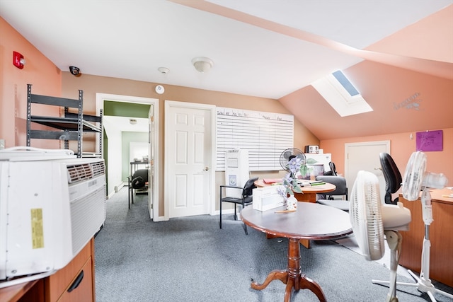 office area with lofted ceiling with skylight and carpet