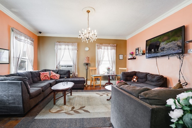 living room with ornamental molding, a chandelier, and hardwood / wood-style flooring