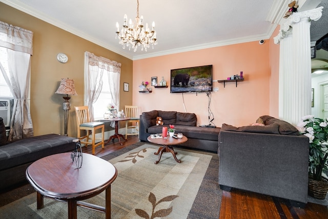 living room featuring ornamental molding, a chandelier, and dark hardwood / wood-style flooring