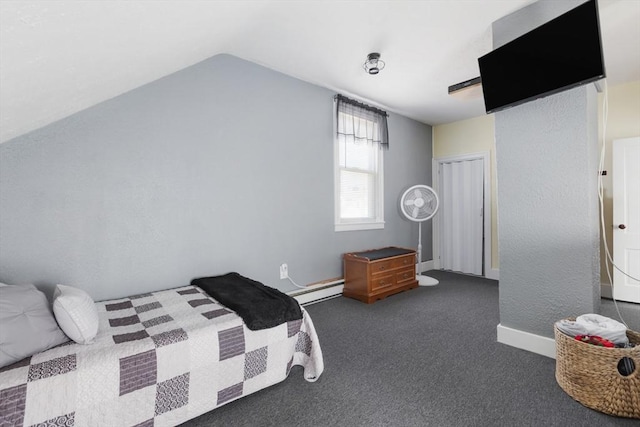 carpeted bedroom with a baseboard heating unit and lofted ceiling